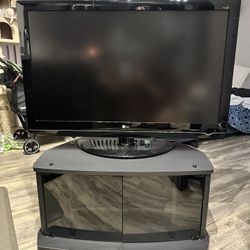 42" TV + Stand + Roku Device + LED