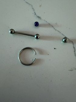 Lip-nose-tongue piercing