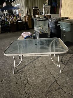 Patio table with glass top nice In Patterson