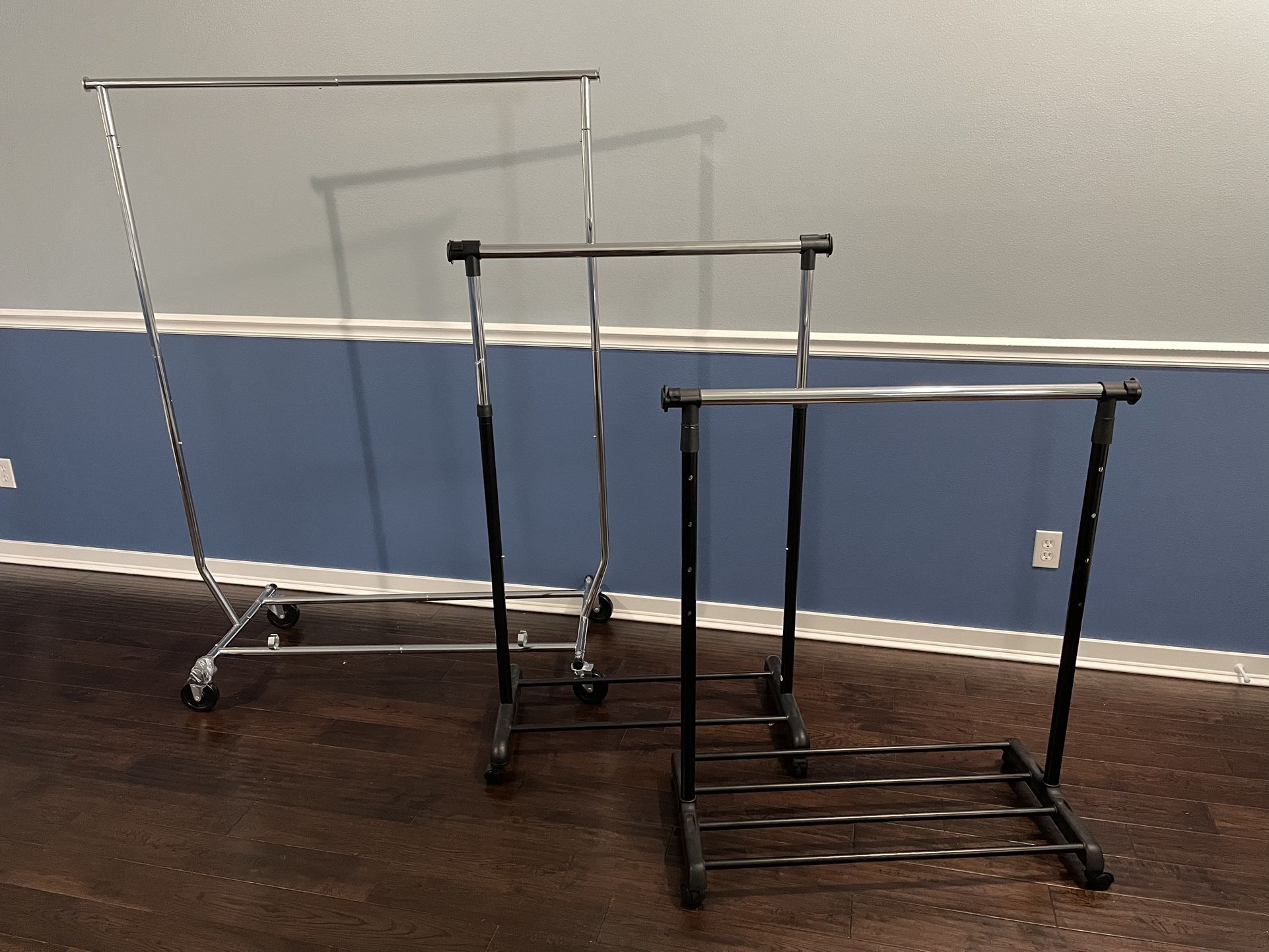 Three Portable Clothing Garment Racks