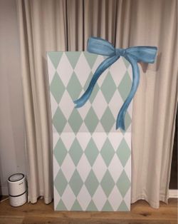 Coroplast back drop (green diamond shapes with blue bow)