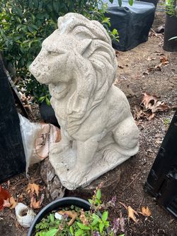 Concrete lion statue,