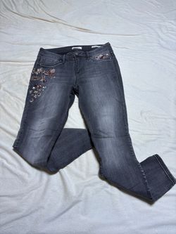 Jessica Simpson Charcoal gray skinny jeans with embroidered floral accents on front pockets and thigh.