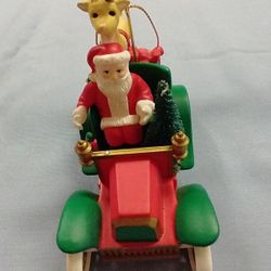 

Santa’s Best Ornament, 3” long x 2" wide x 3.5" high-

