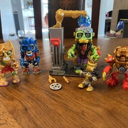 Lot of TreasureX Figures and Partial Mega Lab