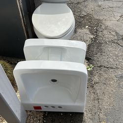 Toilet and 2 sinks