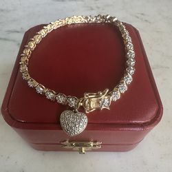 925 gold over Sterling silver, designer Ross Simon , tennis bracelet w/ heart ❤️ charm , diamond cut accents all around , 7.25 in. Double safety latch