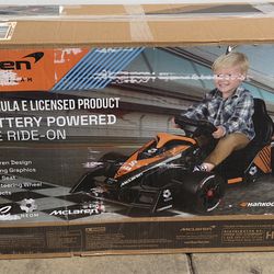 McLaren formula E race 12V battery powered Ride on  car for age 3yrs+ new in box. Pickup In Brooklyn Park 