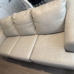Cream Faux Leather Couches - mild wear