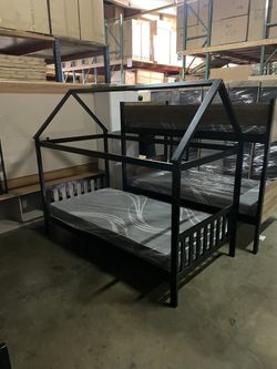 Twin house bed. Available in espresso & white. Assembly required. Assembly not included. Tax included. Free local delivery.  $225 with out mattress $3