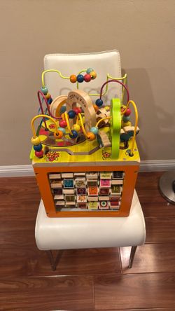 B. Toys Wooden Activity Zany Zoo Alpha Cube