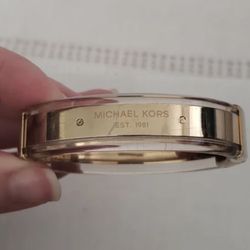 Michael Kors gold hinged bangle bracelet