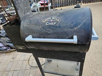 Used grill, heavy. ARLINGTON