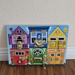Practically New Melissa & Doug Latches Board ( Price Firm!)