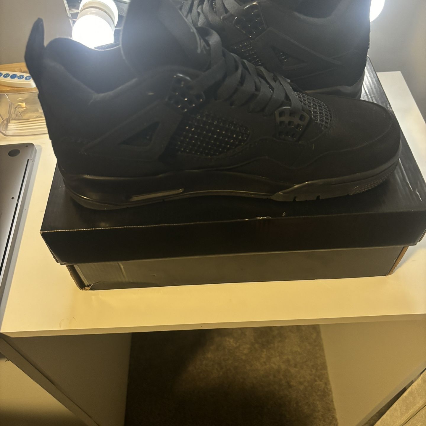 Black Cat Jordan 4s 