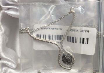 Never Used.  Diamond Accent Necklace in Platinum Bond and Stainless Steel 18 Inch