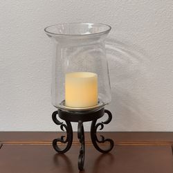 Wrought Iron and Glass Candle Holder with Lit Candle