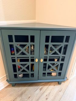 Teal Corner Bar Cabinet with Lattice Doors