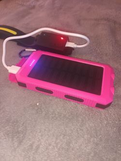 Portable  powered bank charger with solar recharge capability
