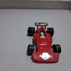 Red Metal Speed Racer Vintage Car With Driver