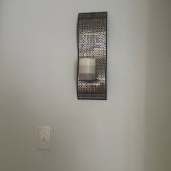 four Candle Holders With Three Pictures 