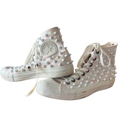Custom Converse All Star with White Ceramic Studs  This pair of Converse All Star sneakers is perfect for any stylish man who wants to stand out from 