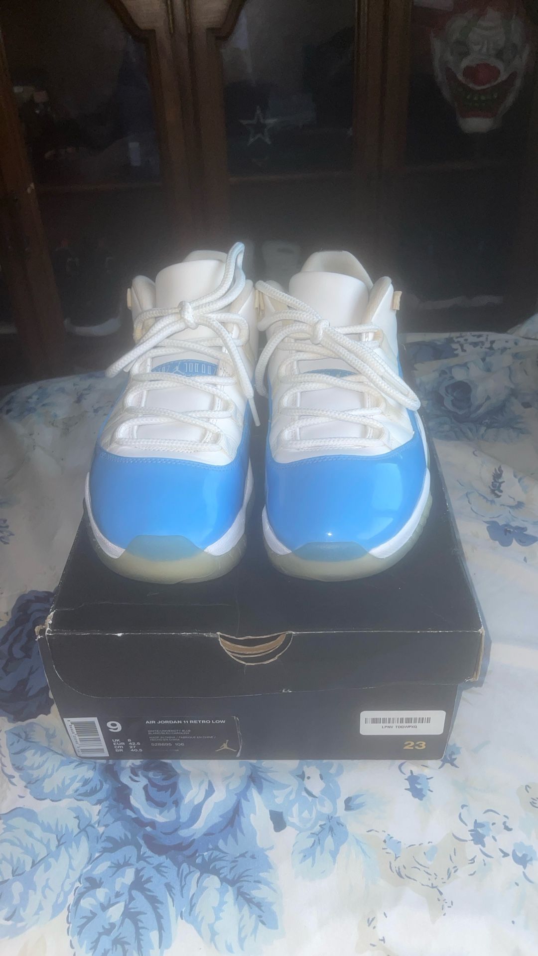 white / university blue air jordan lows