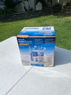 Brand New Waterpik Water Flosser Tooth Brush