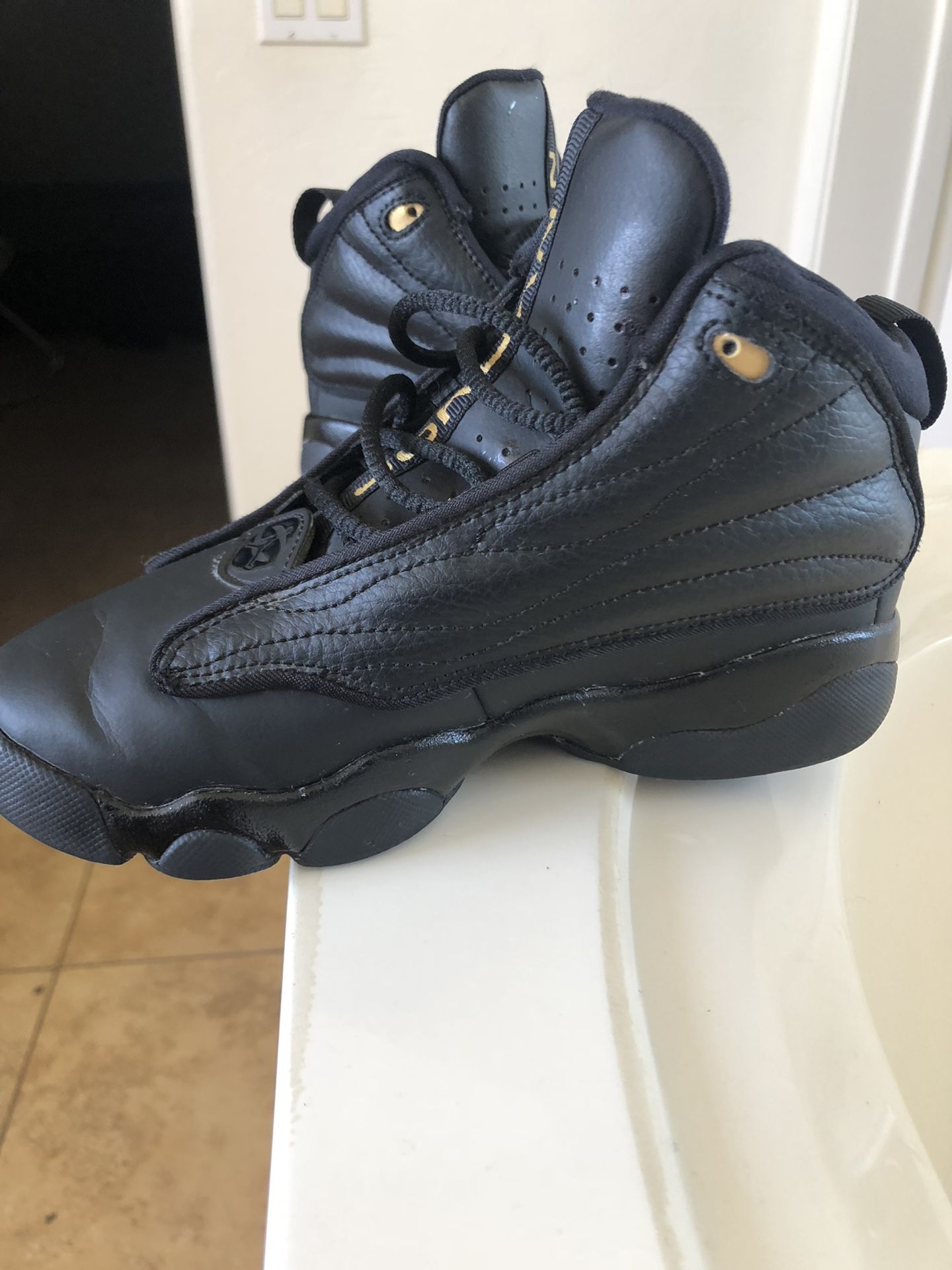 Youth pro strong black and gold