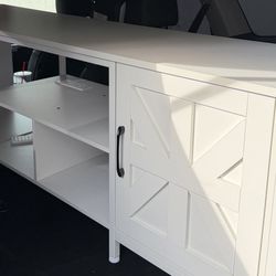 Tv stand with plug ins