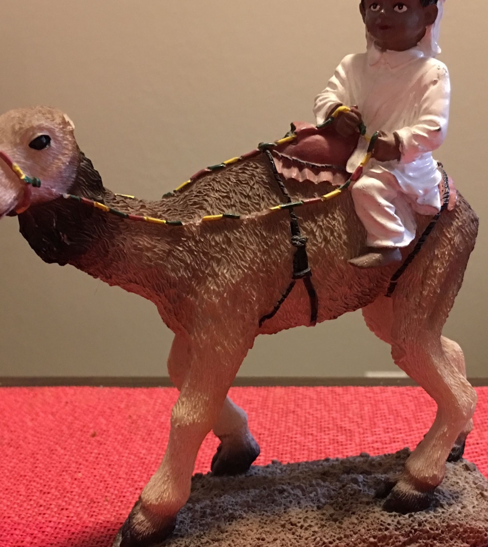 Statue If Boy And Camel New