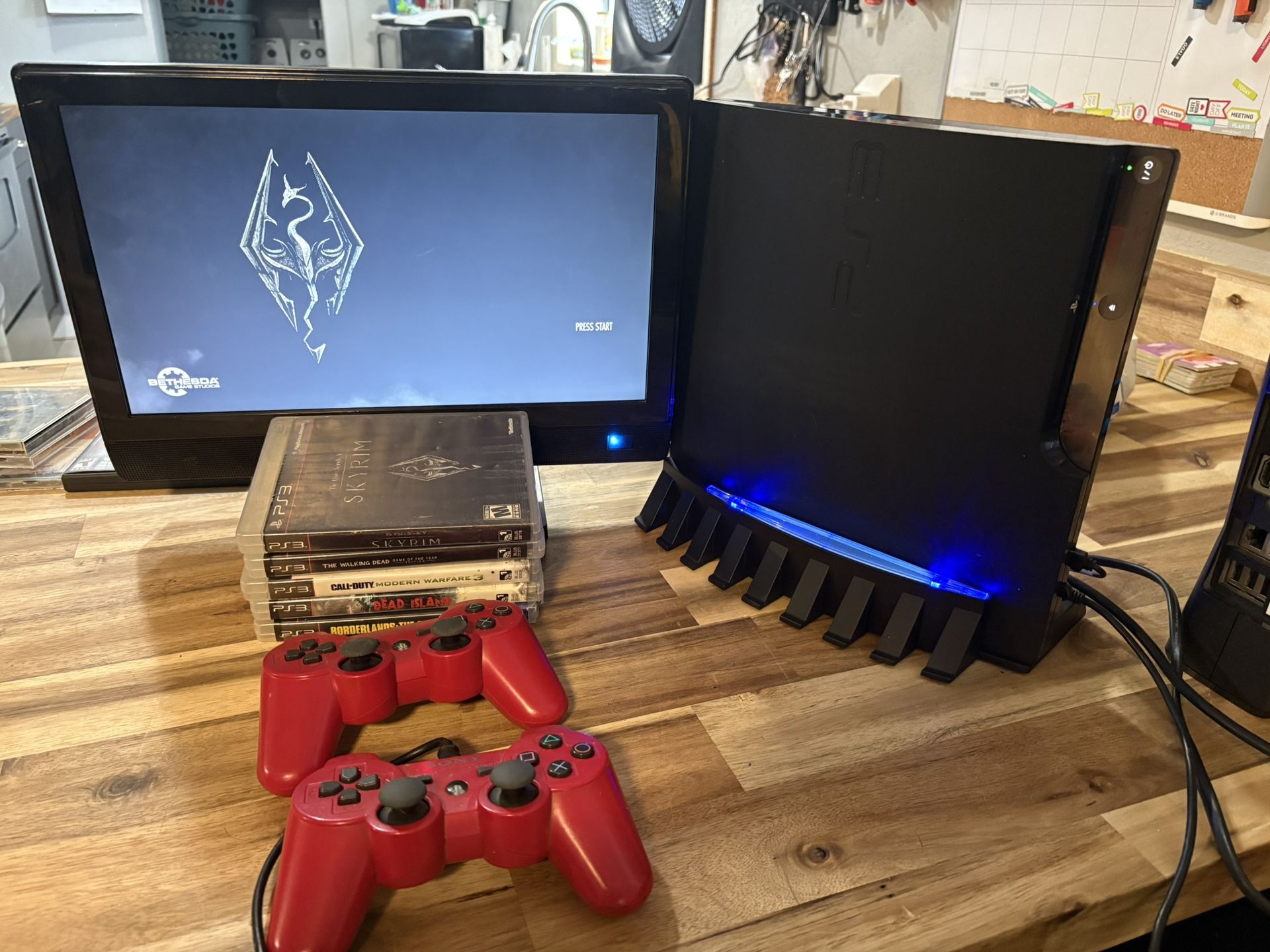 PS3 with 2 controllers an 5 games