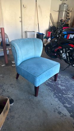 Light blue velvet suede chair.