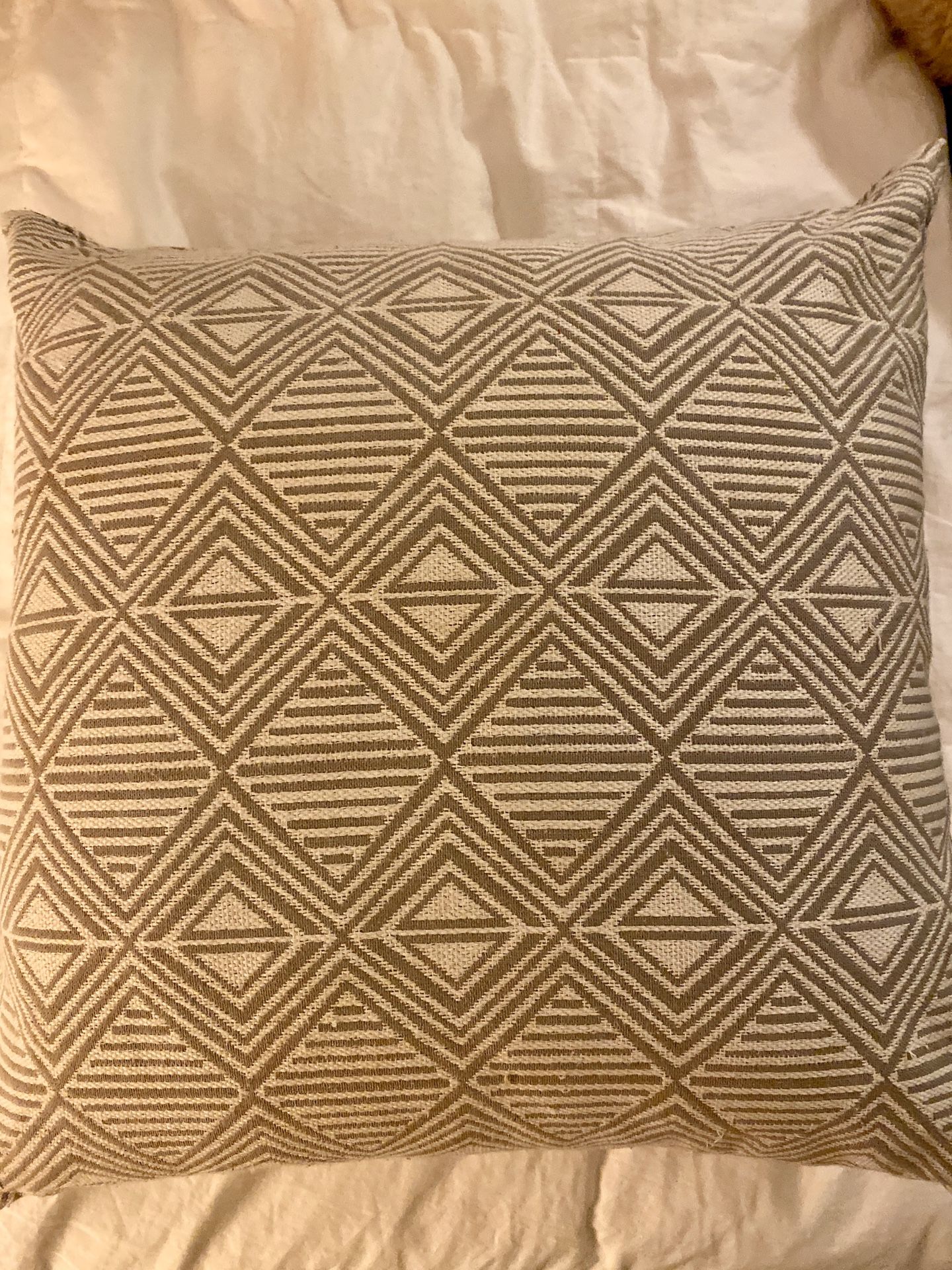 Grey throw pillow