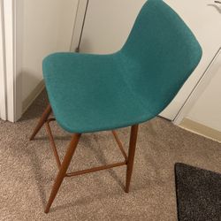 A SET OF 2 TEAL CHAIRS