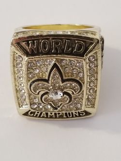 SAINTSCOLTS WORLD CHAMPIONSHIP RING, NEW CONDITION $100. CASH TODAY ONLY!