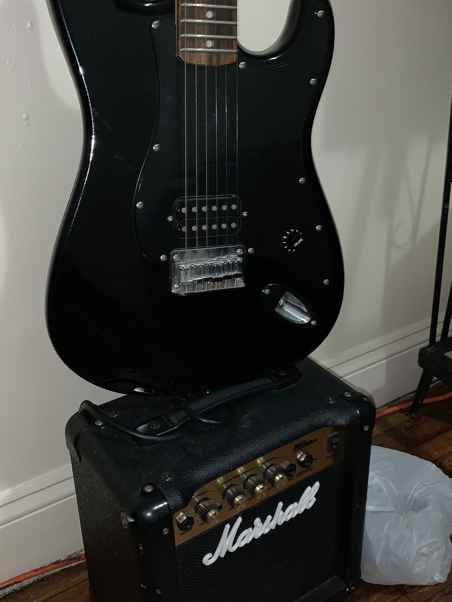 Guitar Electric “Squier” And the electric Bass “Marshall”