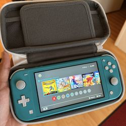 Nintendo Switch Lite with 5 games and case