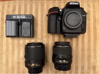 Nikon D7500 with camera lenses and dual battery charger