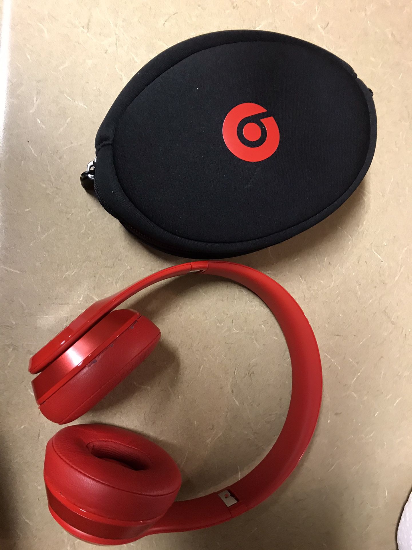 Red Beats solo wireless headphones with case