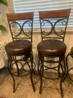$50 each Two Swivel Chairs