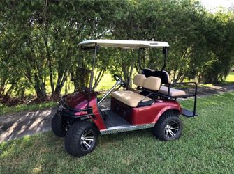 Custom Red EZ Go Golf Cart