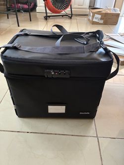 DocSafe branded fireproof document storage bag designed to hold letter or legal …