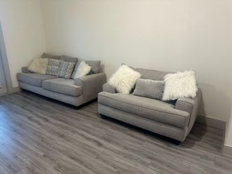 Two set Couches, plus center table