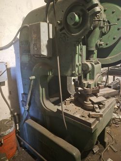 Punch press for sale. Table measurements are 26" x 16". Works excellent. 40 tons.