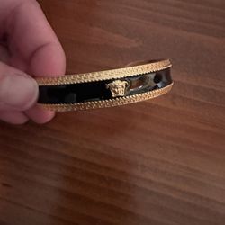 Versace Bangle Worn Once. No visible sign of usage. 