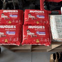 Five Packs Of Huggies Diapers