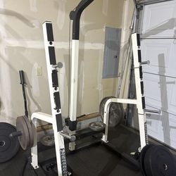 Squat rack and dip/ pull up bar.