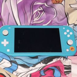 Nintendo Switch Lite Animal Crossing Timmy and Tommy’s Aloha Edition 