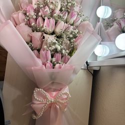 Pink tulips with pink roses bouquet
